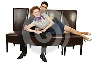 Attractive business people on chairs