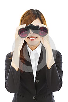 Attractive business woman with binoculars