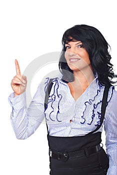 Attractive business woman pointing up