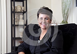Attractive business woman relaxing and smiling