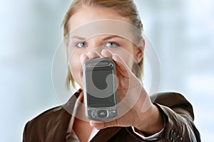 Attractive business woman using a pda