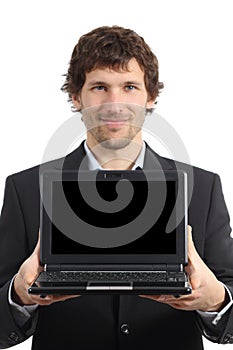 Attractive businessman showing a netbook screen app