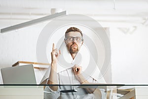 Attractive businessman working on project