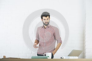 Attractive businessperson using smartphone