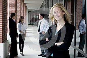 Attractive businesswoman with arms crossed