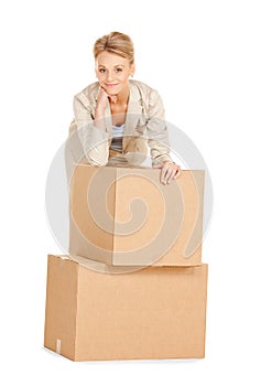 Attractive businesswoman with big boxes