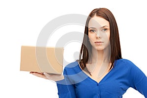 Attractive businesswoman with cardboard box