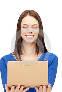 Attractive businesswoman with cardboard box