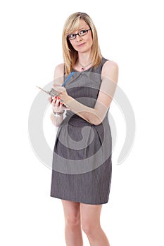Attractive businesswoman make notes on clipboard