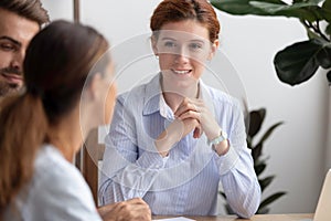 Attractive businesswoman owner hr manager listening vacancy candidates