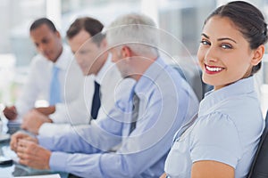 Attractive businesswoman posing in the meeting room