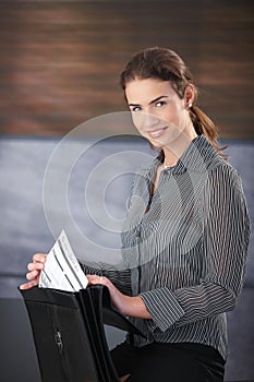 Attractive businesswoman smiling happily