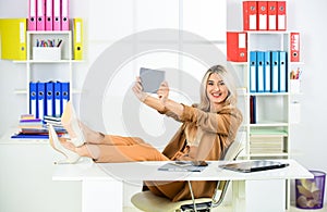 attractive businesswoman using digital tablet. smiling designer student. freelancer business woman with tablet computer