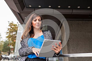 Attractive businesswoman using a tablet computer