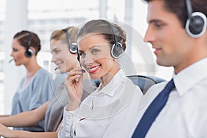 Attractive call centre agent with a headset photo