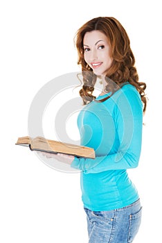 Attractive casual woman with open book.