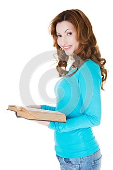 Attractive casual woman with open book.