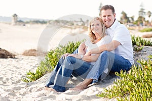 Attractive Caucasian Couple Relaxing at the Beach