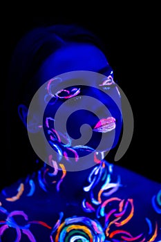 Attractive caucasian girl with fluorescent make-up