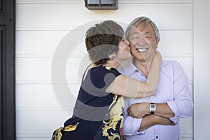 Attractive Chinese Couple Enjoying Their House