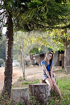 An attractive Chinese woman in a summer dress