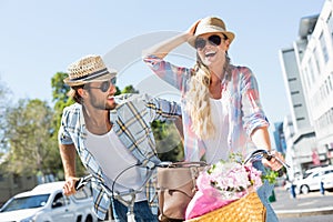 Attractive couple on a bike ride