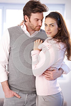 Attractive couple embracing