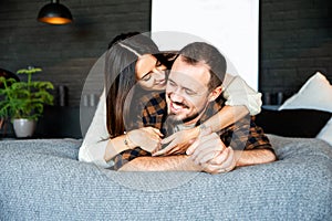 Attractive couple in love on the bed