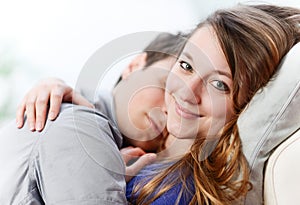 Attractive couple of lovers lengthened the one on the other one photo