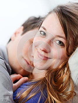 Attractive couple of lovers lengthened the one on the other one photo