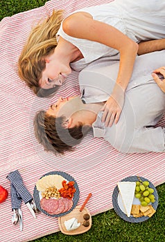 Attractive couple on romantic afternoon picnic