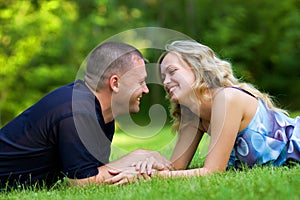 Attractive couple together on meadow