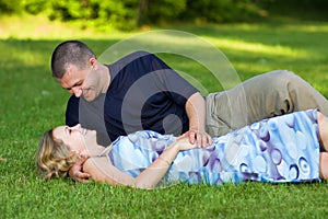 Attractive couple together on meadow