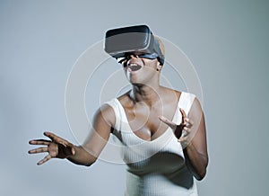 attractive curious black afro american woman wearing VR 3d visio