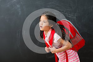 Attractive cute little girl student back to school