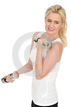 Attractive Determined Fit Healthy Young Blonde Woman Working Out with Dumb Bell Weights