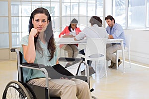 Attractive disabled businesswoman at work