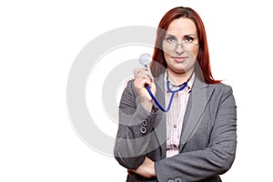 Attractive doctor or physician looking over glasses