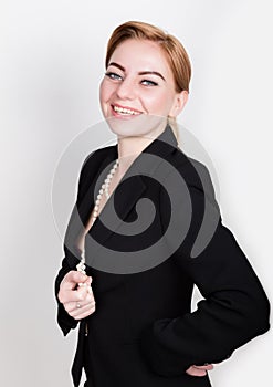 Attractive and energetic business woma in a suit on naked body smiling