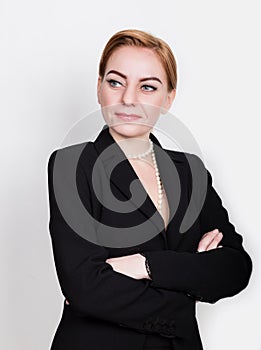 Attractive and energetic business woma in a suit on naked body smiling