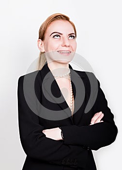 Attractive and energetic business woma in a suit on naked body smiling