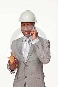 Attractive ethnic architect on phone