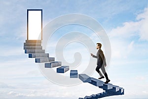 Attractive european man climbing sky stairs to success and opprtunity with open door and mock up place