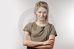 Attractive exited woman with opened mouth and surprised expression.