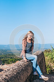 Attractive fashionable cute blonde travels to Luberon