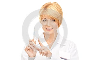 Attractive female doctor with thermometer