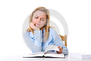 Attractive female student in blue shirt read book