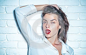 Attractive female in studio.Young woman. Close up shot.