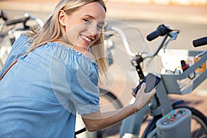 attractive female using smartphone for banking online