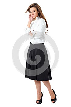 Attractive female in white shirt and black skirt